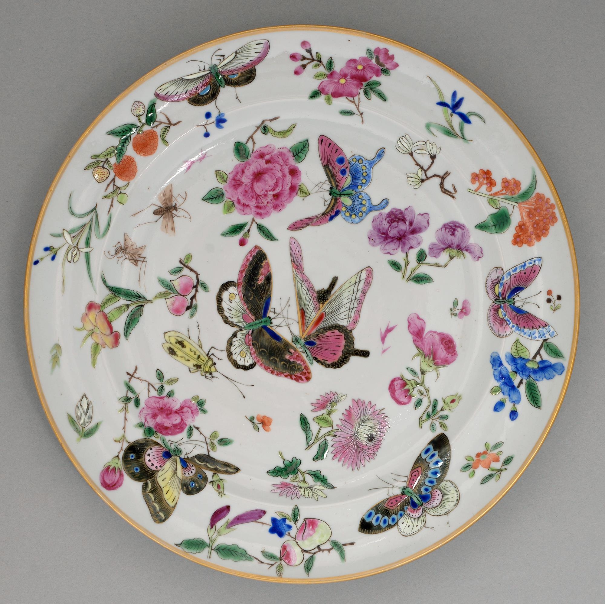 A Chinese famille rose 'Butterflies' plate, early 19th c, enamelled with crickets and other insects,