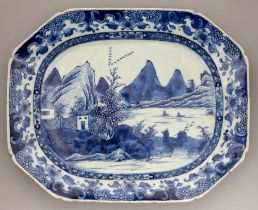 A Chinese blue and white dish, early 19th c, sketchily painted and washed-in with two figures on a