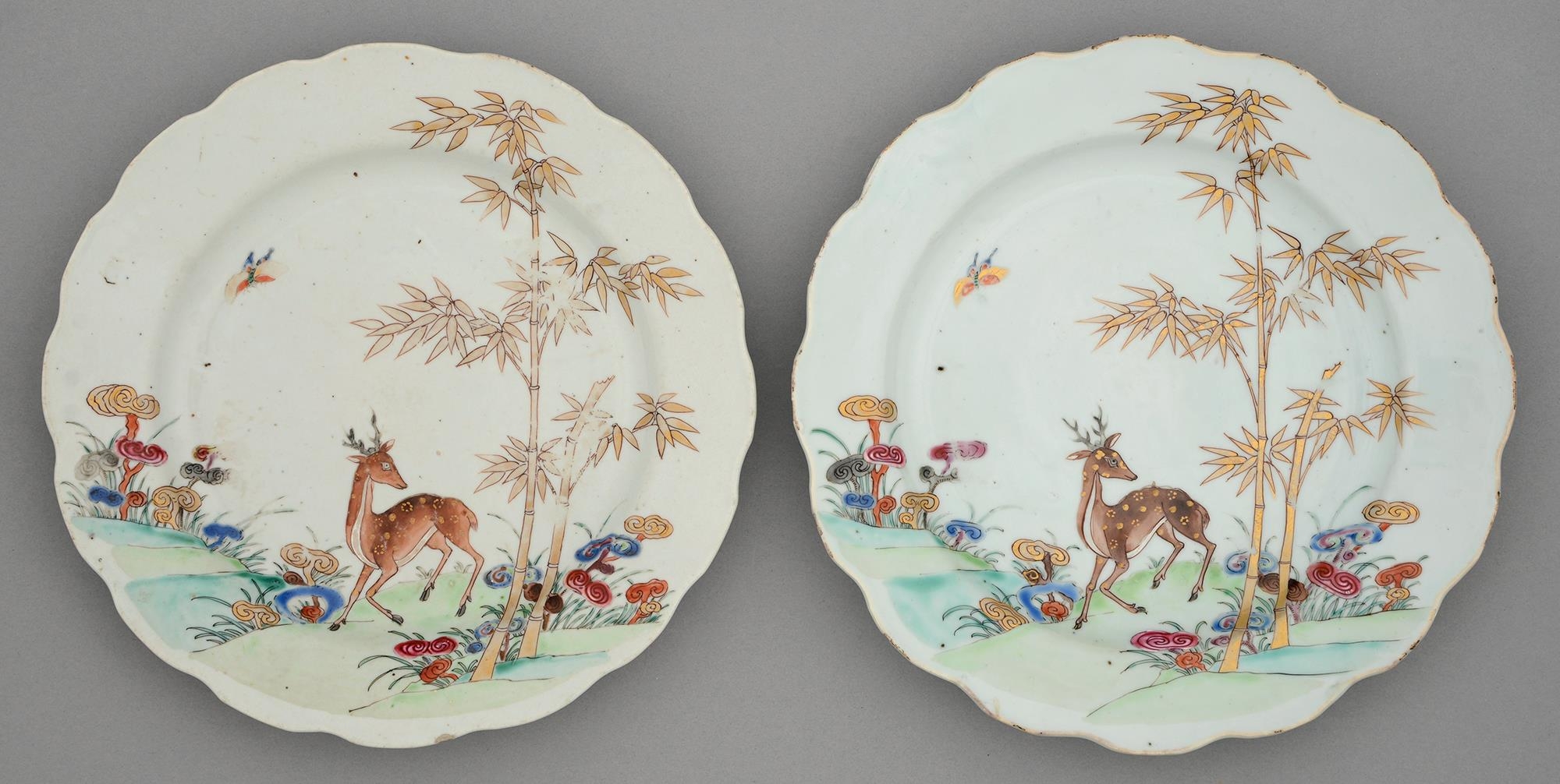 A pair of Chinese famille rose plates, 18th c, enamelled with deer, bamboo and sacred fungus, 23cm