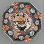 An Imari octagonal dish, 18th c, pierced with seigaiha, painted to the centre in dark underglaze