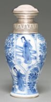 A Chinese blue and white baluster vase, 18th c, painted with a young woman and flowers in