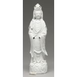 A Chinese blanc de chine figure of Guanyin, 19th c, 44cm h Lacking one of the detachable hands,