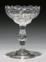 A sweetmeat glass, c1790, the faceted ogee bowl on facet cut stem and octagonal foot, 19cm h