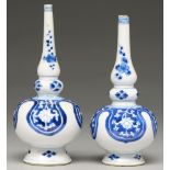 Two Chinese blue and white rosewater sprinklers, 18th c, painted with flower filled lappets