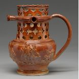 A Derbyshire saltglazed brown stoneware puzzle jug, Chesterfield, c1835, conventionally sprigged