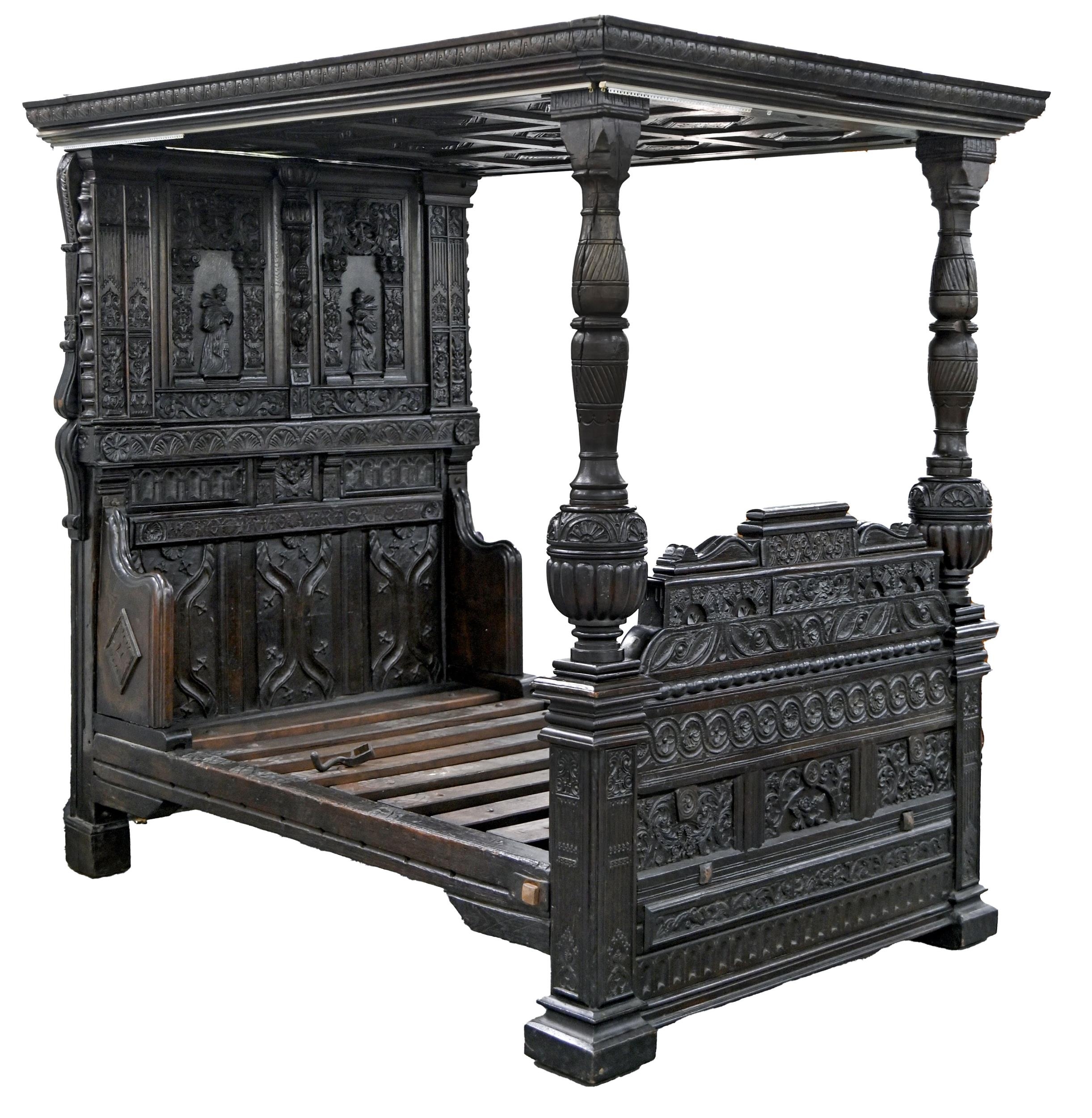 An oak four poster bed, mid 17th c,  the diamond panelled tester with carved cushion moulded