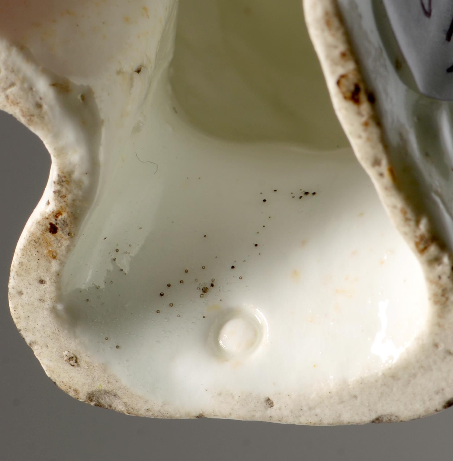 A pair of Staffordshire bone china models of spaniels, c1850, sponged in black enamel, 10.5cm h - Image 3 of 3