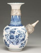 A Chinese blue and white kendi, 19th c, with later silver mounts, painted with flowers in barbed