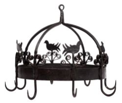 Folk art. A wrought iron dangle spit, with crown above a girdle of birds alternating with scrolls