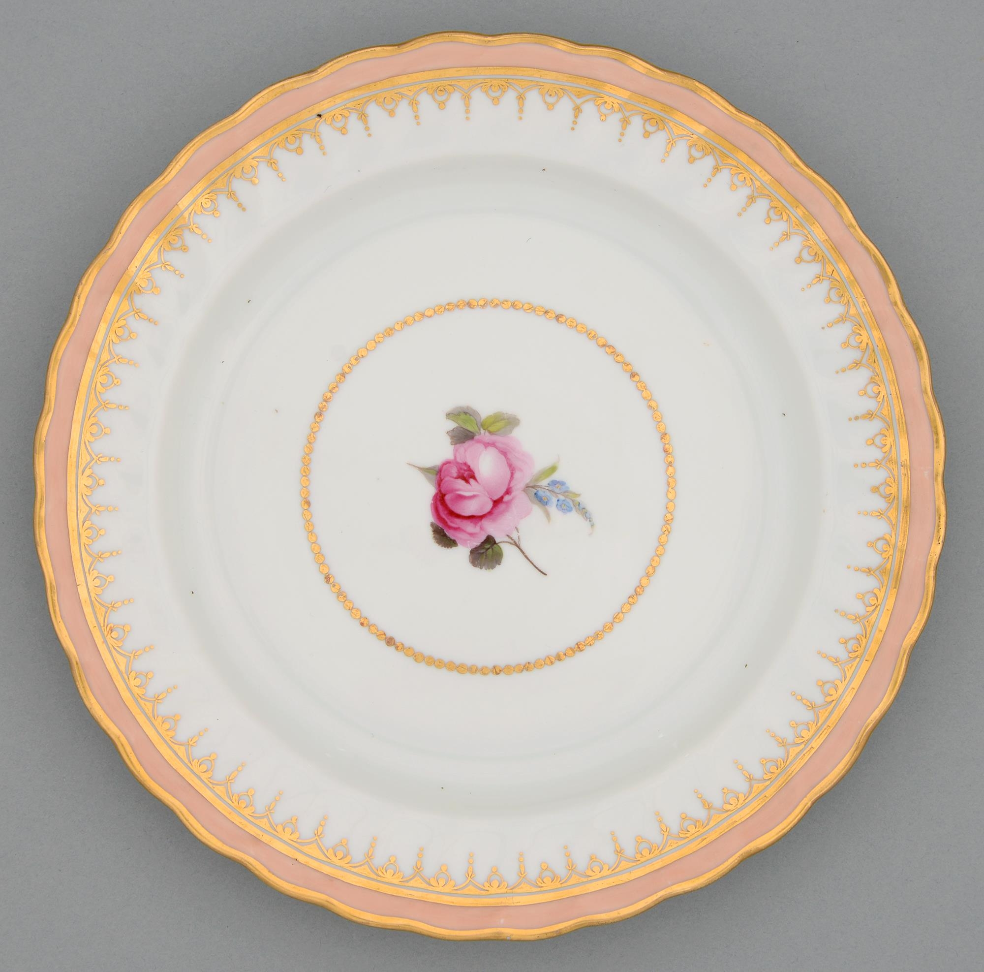 A Derby plate, c1790, painted by William Billingsley with a central rose in fluted salmon pink and