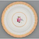 A Derby plate, c1790, painted by William Billingsley with a central rose in fluted salmon pink and