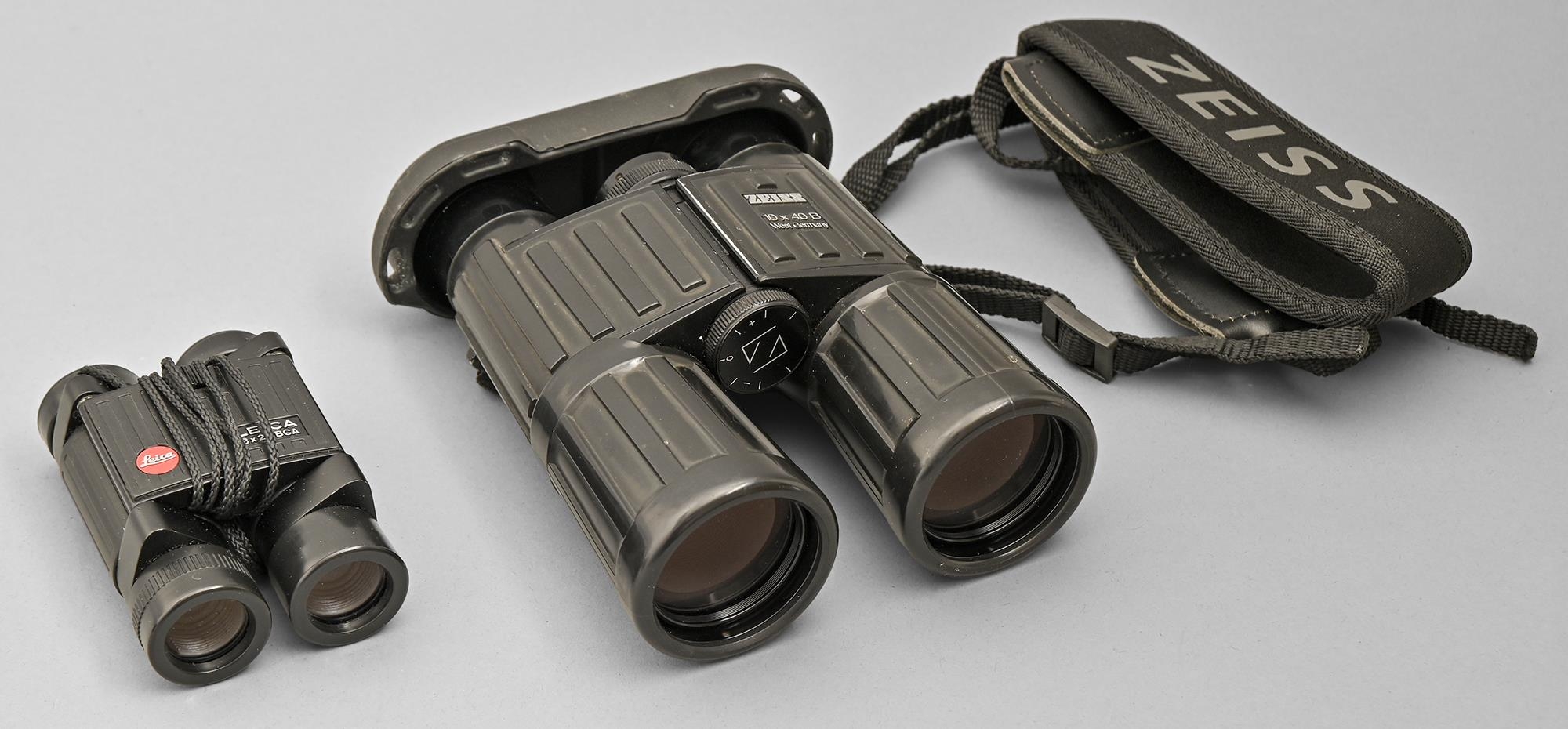 Binoculars. Two, Leica 8x20BCA, in zipped pouch and Zeiss 10x40B, rubberised, zipped black leather