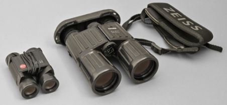 Binoculars. Two, Leica 8x20BCA, in zipped pouch and Zeiss 10x40B, rubberised, zipped black leather