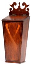 A George III oak, mahogany and inlaid wall hanging cutlery box, with sloping lid and fretted back,