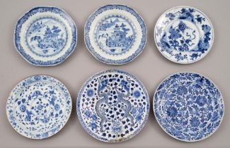 Four and a pair of Chinese blue and white plates, 18th and 19th c, painted with dragons, landscape