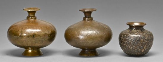 Two Indian brass water vases, lota, 18th / 19th c, of compressed form with reeded cordon around