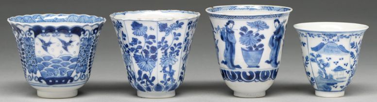 A Chinese blue and white octagonal beaker, Kangxi period, painted in upright registers with