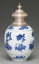 A Chinese blue and white jar, 18th c, lobed oviform and painted with flowering plants, later