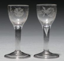 Two wine glasses, mid 18th c, the ovoid bowl similarly engraved with Jacobite rose and bird, on