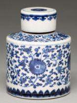 A Chinese blue and white tea caddy and cover, 19th / 20th c, painted with lotus meander, 12.5cm h