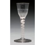 A wine glass, c1770, the fluted ogee bowl on double series opaque twist stem, 15cm h Undamaged