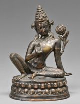 A South East Asian silvered brass sculpture of Avalokita Chittravishrama, on double lotus base,