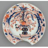 An Imari barber's bowl, Edo period, 18th / 19th c, painted in underglaze blue and enamelled in red