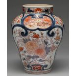 An Imari jar, Edo period, 18th c, painted in underglaze blue with fan shaped panels of