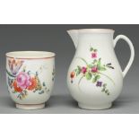 A Worcester sparrow beak jug and coffee cup, c1770, the jug enamelled with a floral pattern and