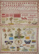 A French red work and polychrome spot sampler, A Déelen 1869, finely embroidered in brightly