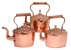 Three Victorian copper kettles, one round, the others oval, each seamed, 27cm h and circa All good