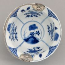 A Chinese blue and white bowl, Kangxi period, painted with auspicious objects alternating with