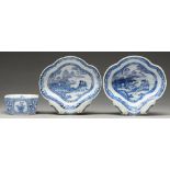 Two Chinese blue and white shell shaped dessert dishes, early 19th c, painted with riverside