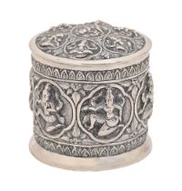 An Indian silver repousse canister and cover, late 19th c, chased with deities, 92mm h, 6ozs 3dwts