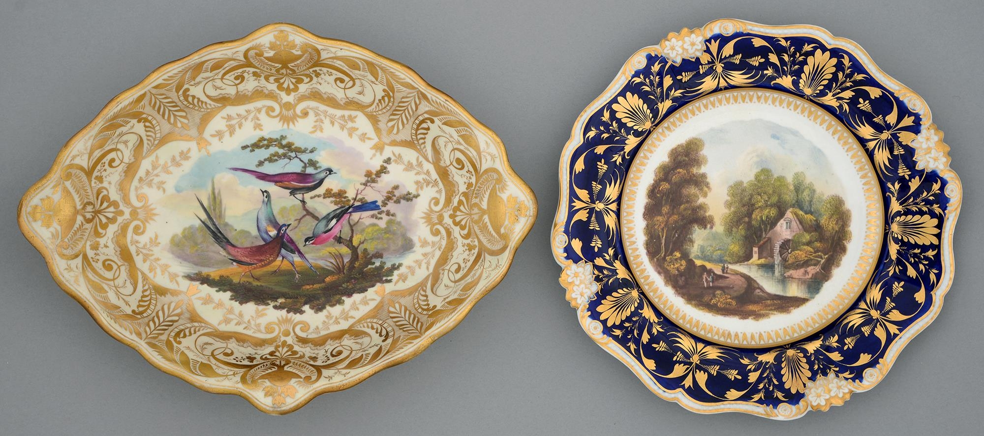 A Derby plate, c1830, painted by Daniel Lucas with a watermill, in blue and gilt border, 22.5cm
