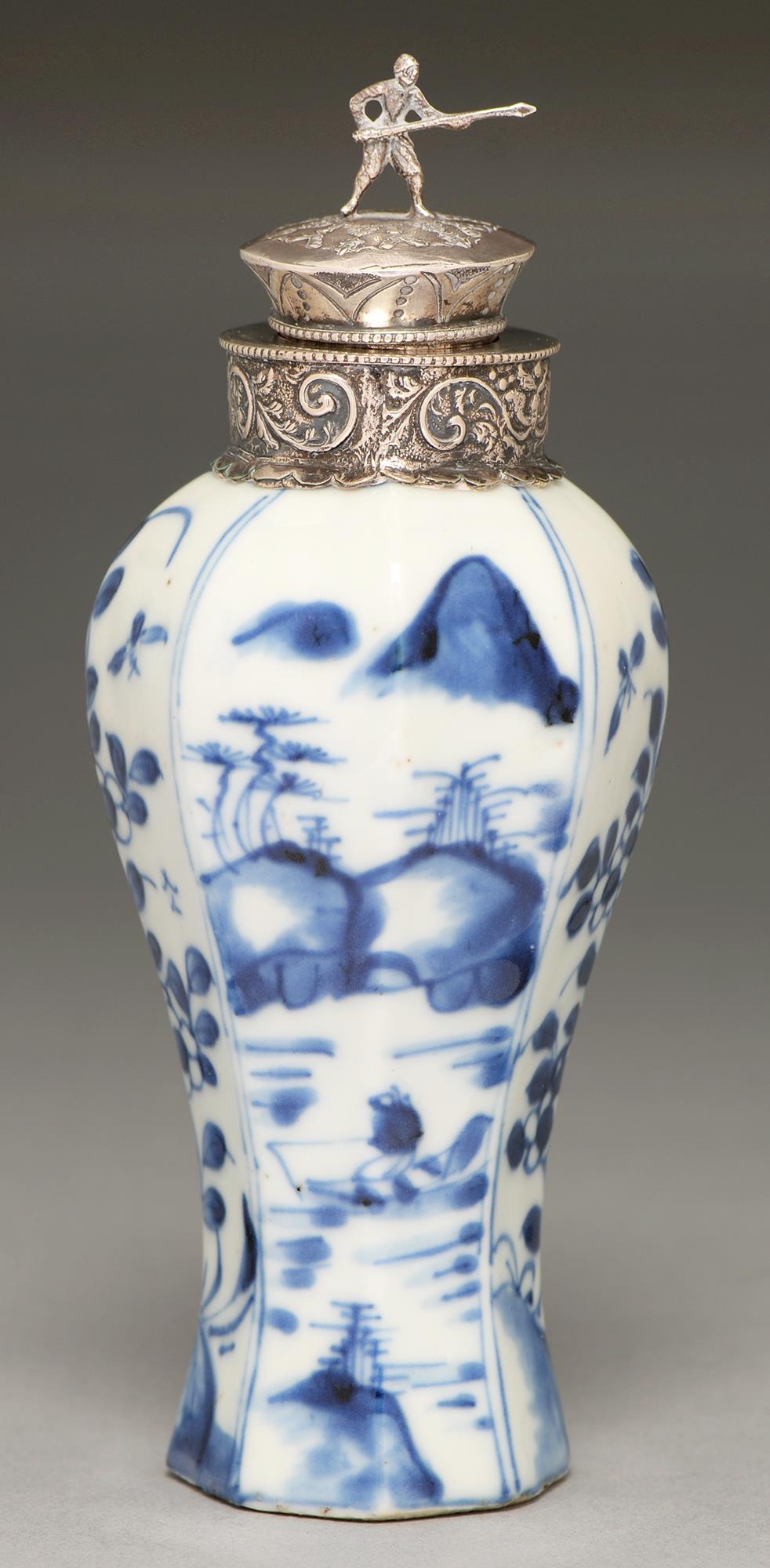 A Chinese blue and white waisted octagonal vase, 18th / 19th c, painted in underglaze blue with