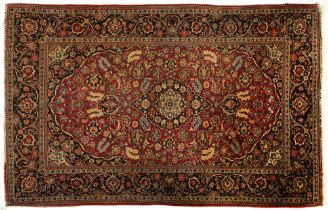 A Kashan rug, 132 x 207cm