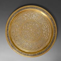 A brass Cairo ware dish, Egypt or Syria, 19th / early 20th c, with applied silver decoration and