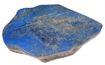 Minerals. A lapis lazuli bolder, Afghanistan, polished, irregular, approximately 12.5cm; 37 x 57cm