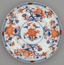 A Chinese Imari dish, 18th c, painted and gilt with lotus and other flowering plants in panelled