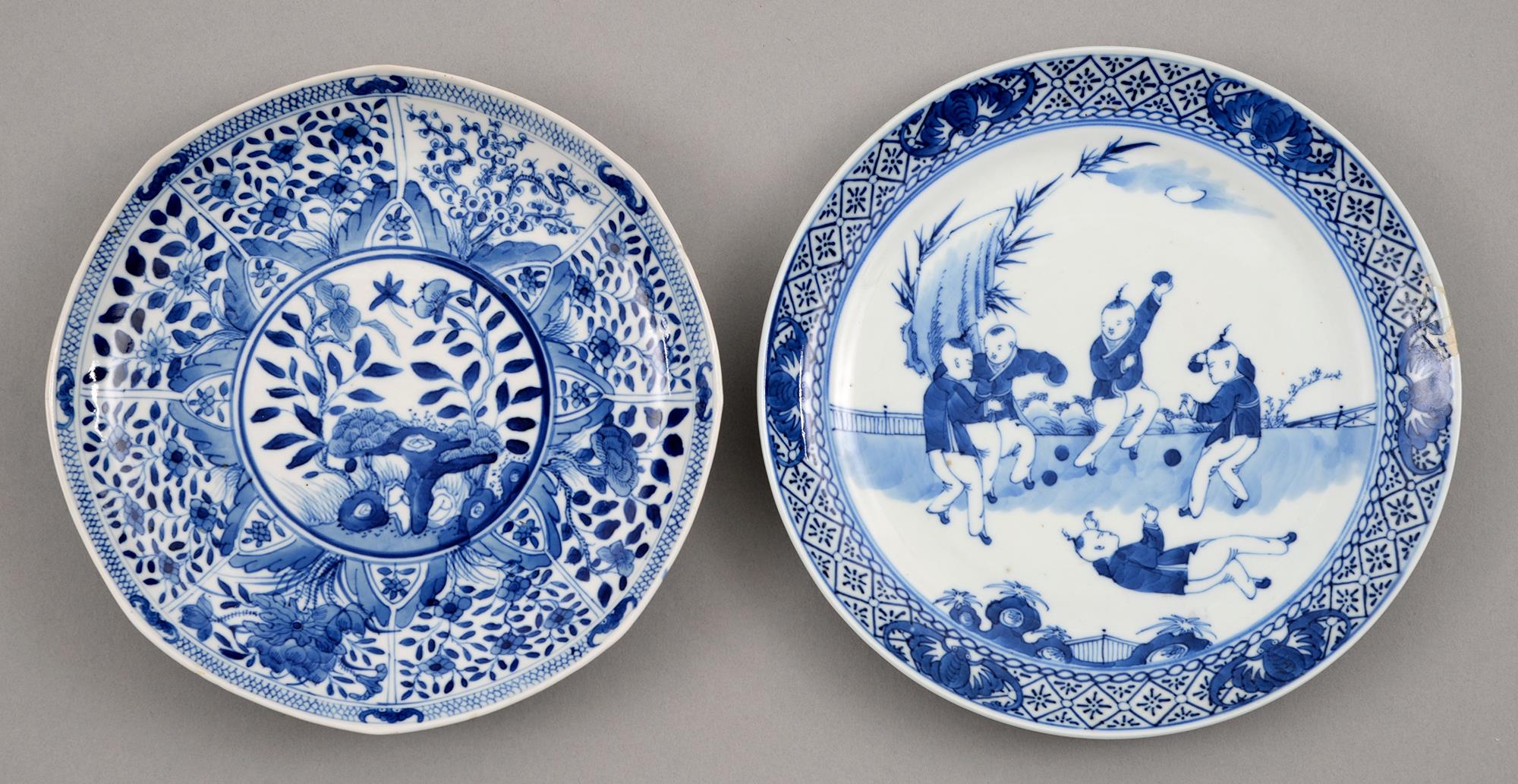 Two Chinese blue and white plates, 18th and 19th c, painted with flowering plants in panelled border
