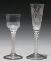 A wine glass, c1770, the fluted ogee bowl on double series opaque twist stem, 14.8cm h and an ale