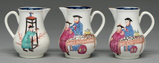 Three Worcester sparrow beak jugs, c1765, with underglaze blue border and painted with thee