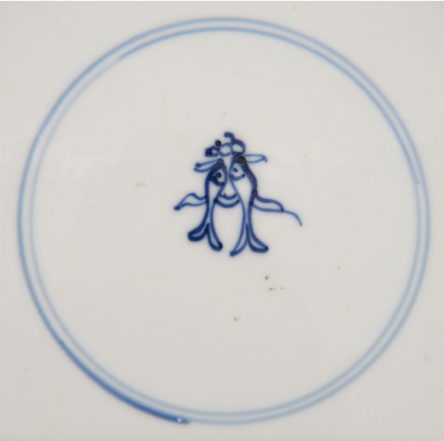 Two graduated Chinese blue and white plates, 18th c, painted with dragon and carp rising from - Image 4 of 5