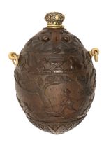A coconut flask, probably French, late 18th / early 19th c, crisply carved with a continuous hunting