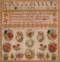 A Victorian linen sampler, Elizabeth Ann Garrood aged 14 years 1866, worked in brightly coloured