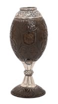 A coconut mate cup, Mexican/Latin American, 19th c, carved with a monogram on a shield and a