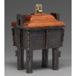 A Chinese bronze archaistic censer, Fang Ding, 17th / 18th c and a Chinese wood cover, the