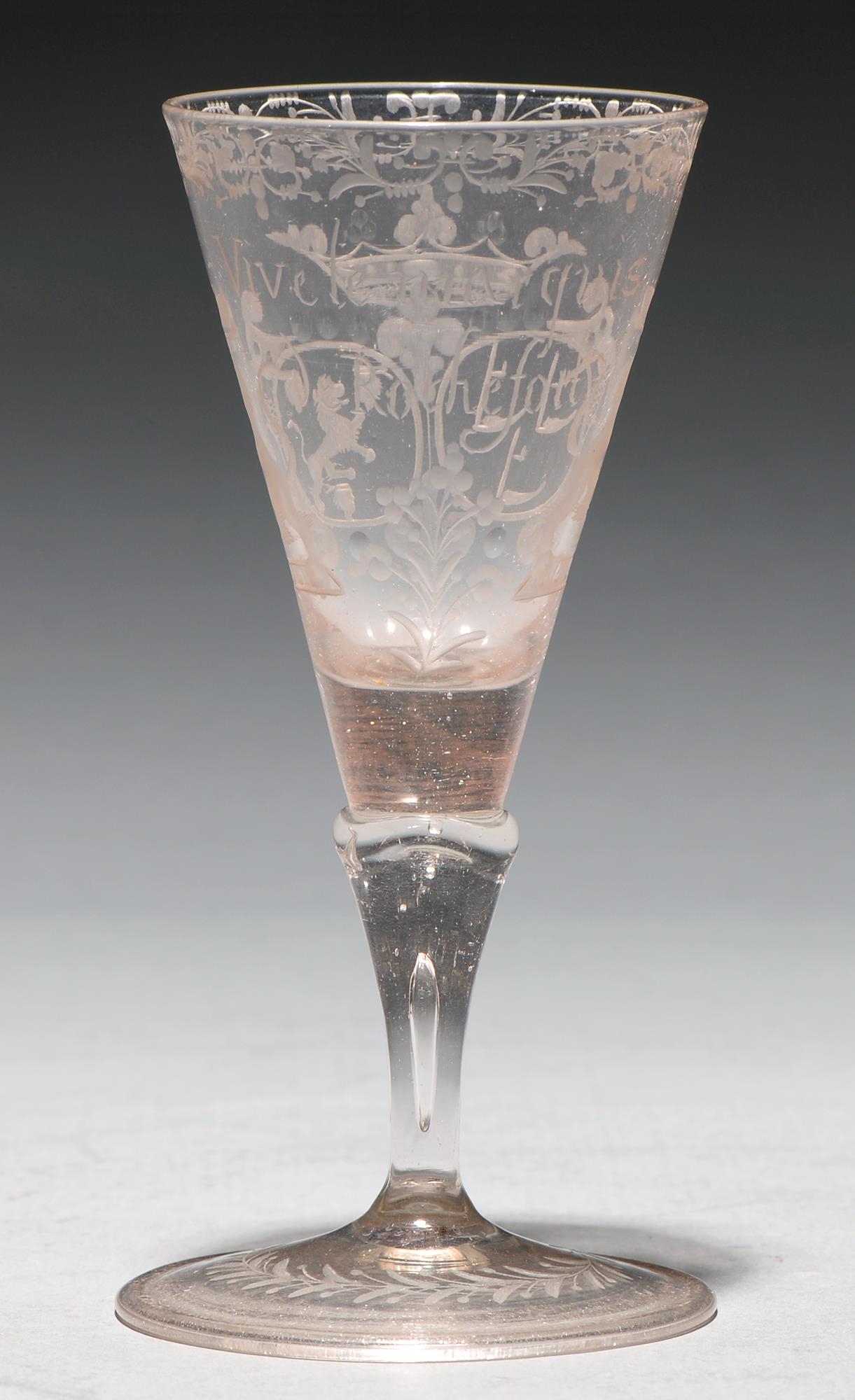 A German wine glass, 18th c, soda metal, engraved with two shields of arms, aquilegia??, coronet and