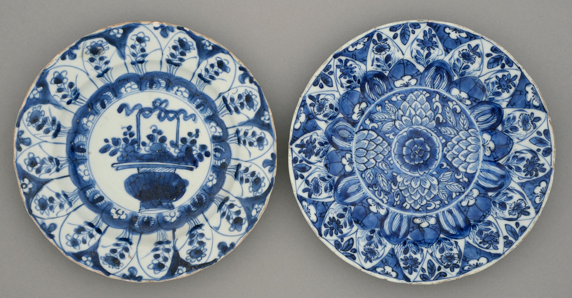 Two Chinese blue and white plates, Kangxi period, painted with a flower filled basket or formal